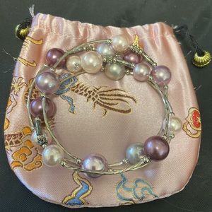 Bracelet- wrap a round;  pink / purple in color